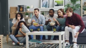 family enjoying superbowl live stream